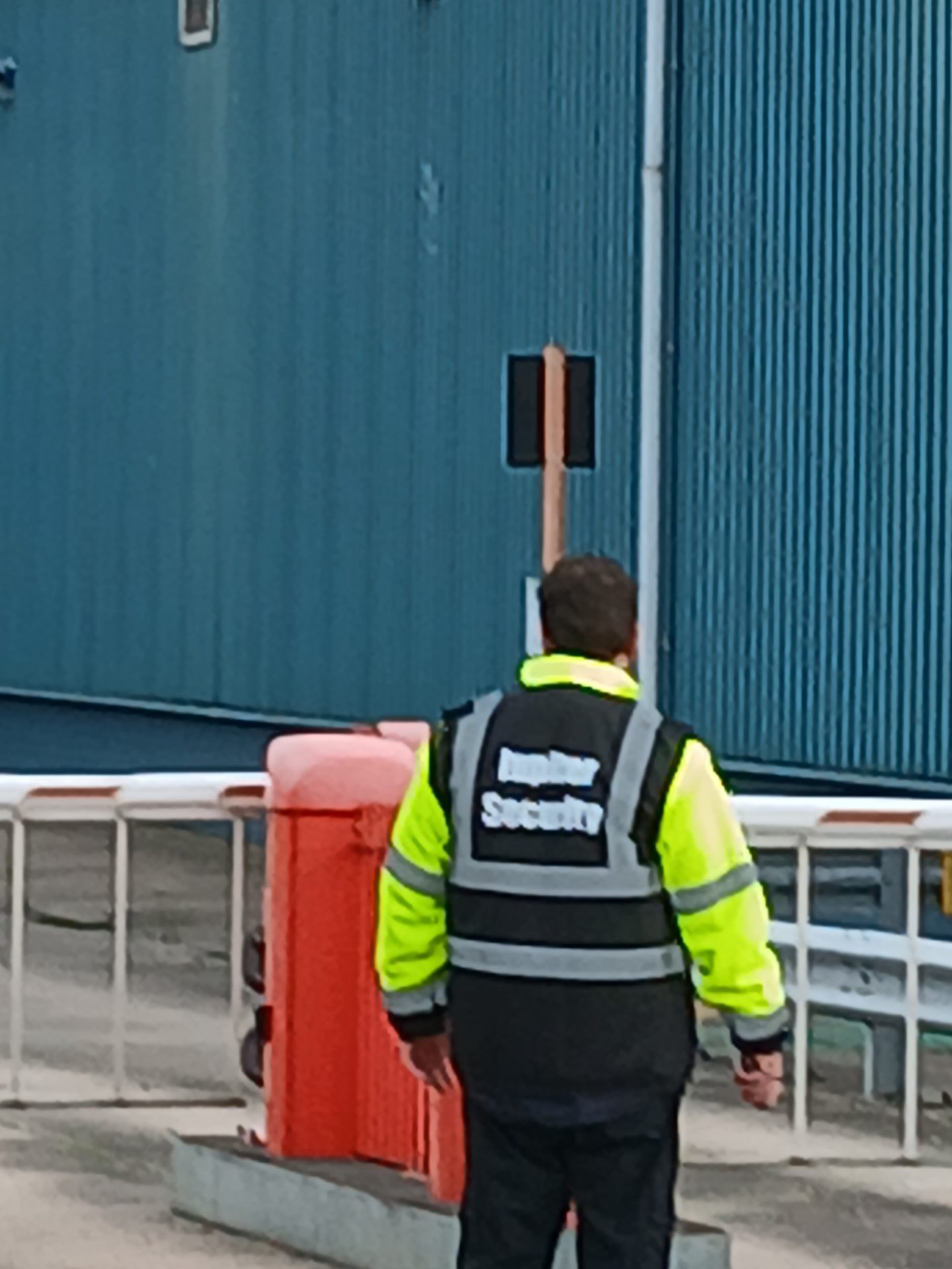 Security personnel at entrance