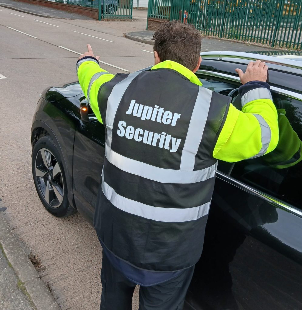 Security personnel directing traffic